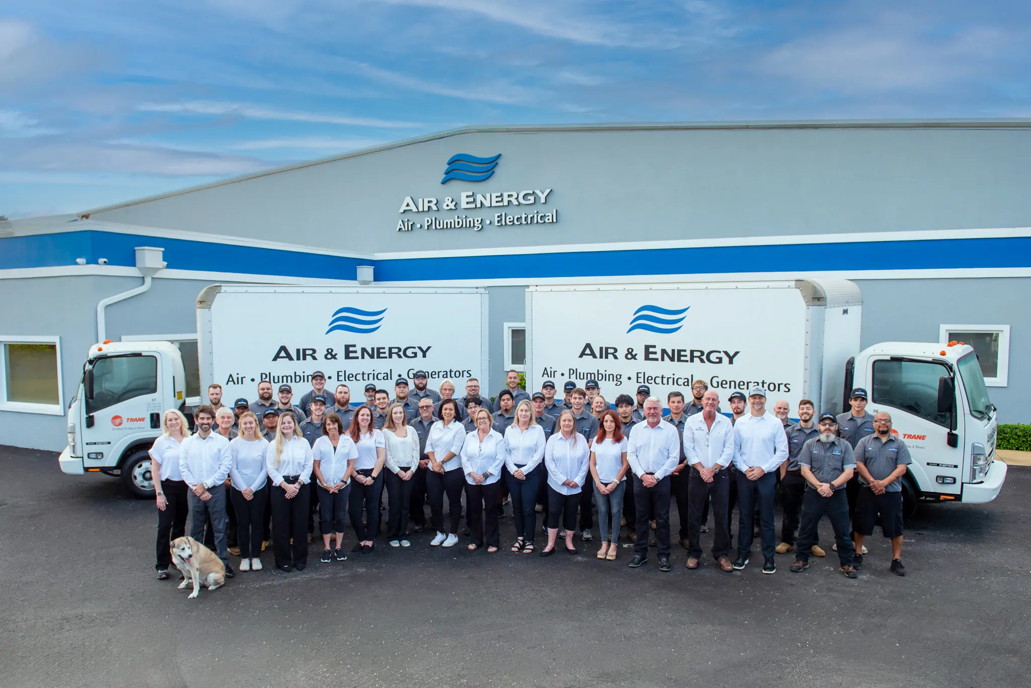 The Air & Energy team outside the company building.