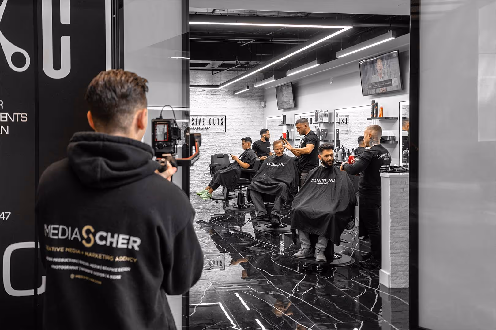 Tyler Scher video production at Exclusive Cuts Barbershop in Bell Works Holmdel, NJ