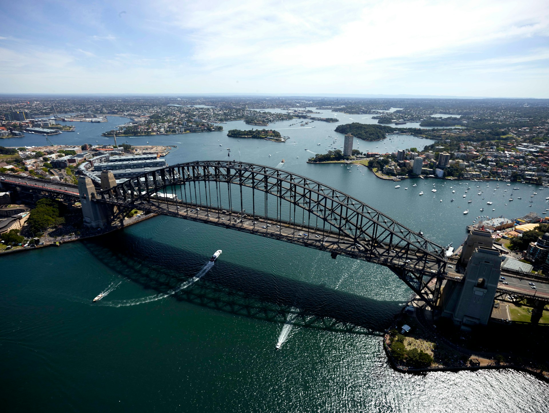 Aerial view of the Sydney Harbour Bridge spanning across Sydney Harbour