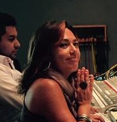 music producer lost in thought while working