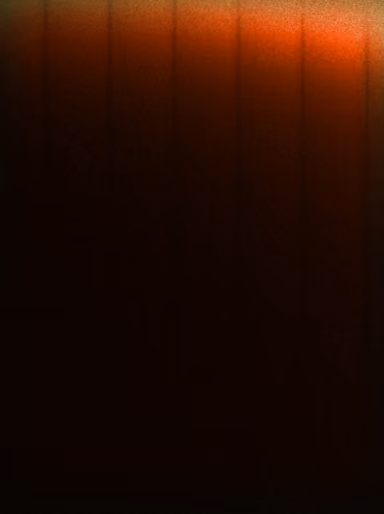 Abstract gradient background with a dark base transitioning to a glowing orange-red top edge with subtle vertical lines.