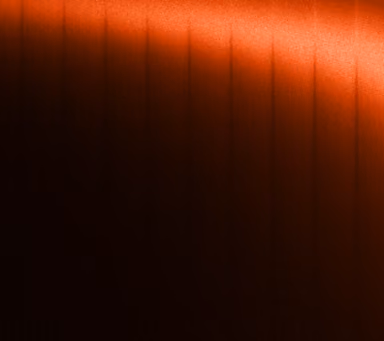 Abstract gradient background with dark vertical lines fading from bright orange at the top to deep brown at the bottom.