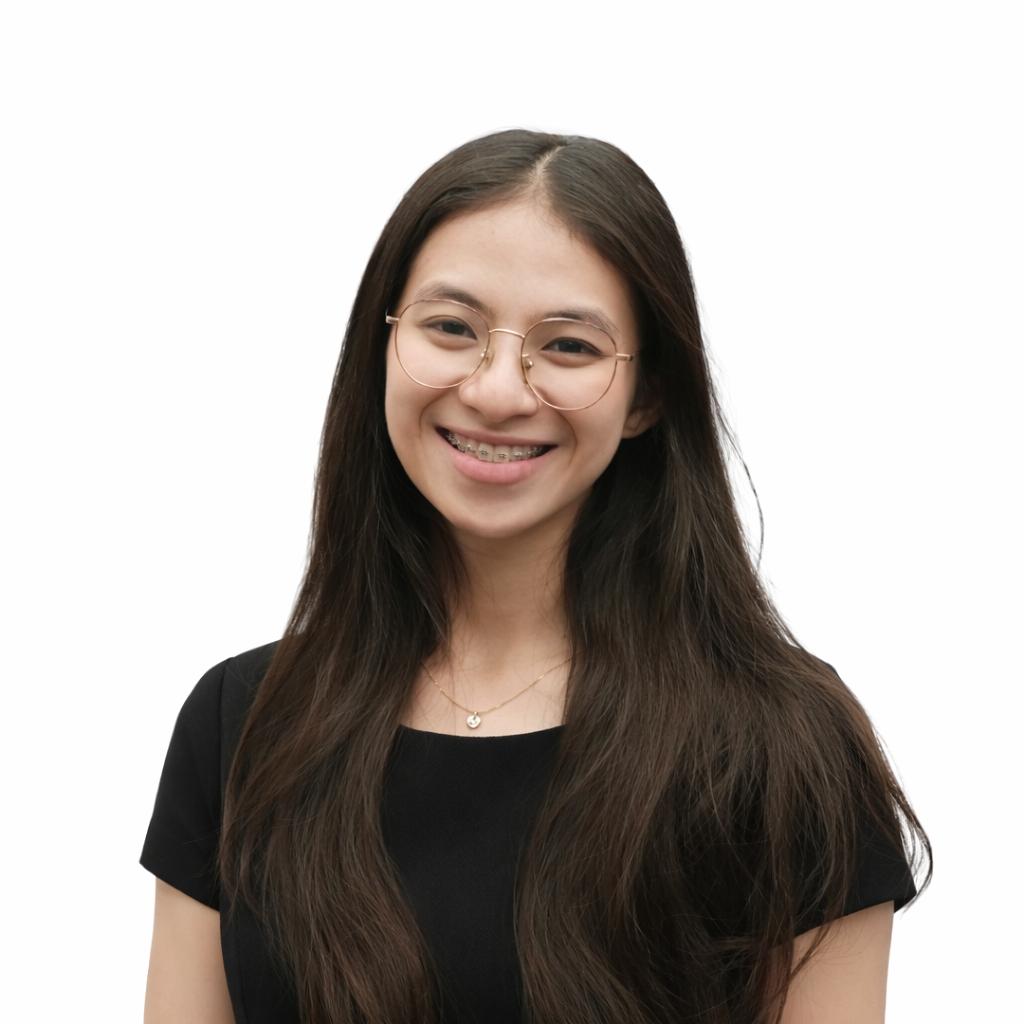 A smiling woman with long hair and glasses