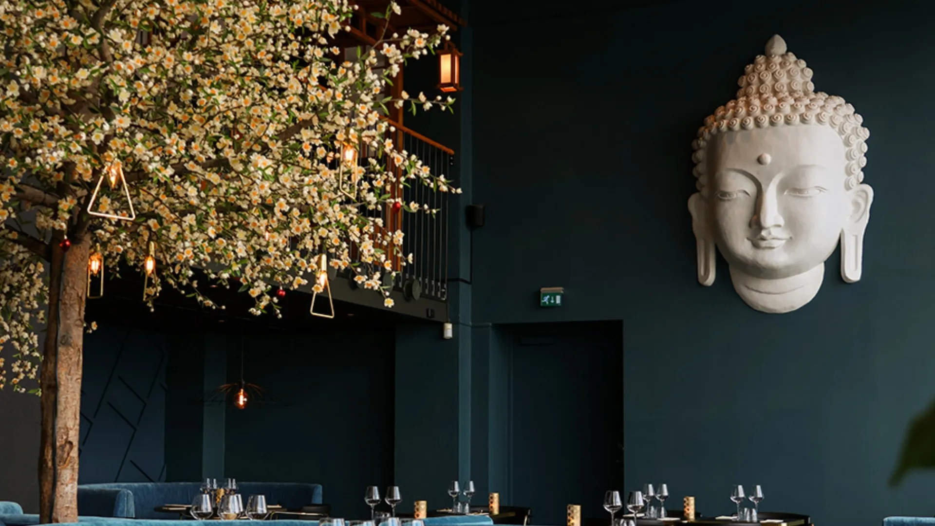 komo korean steakhouse dining hall with buddha on the wall