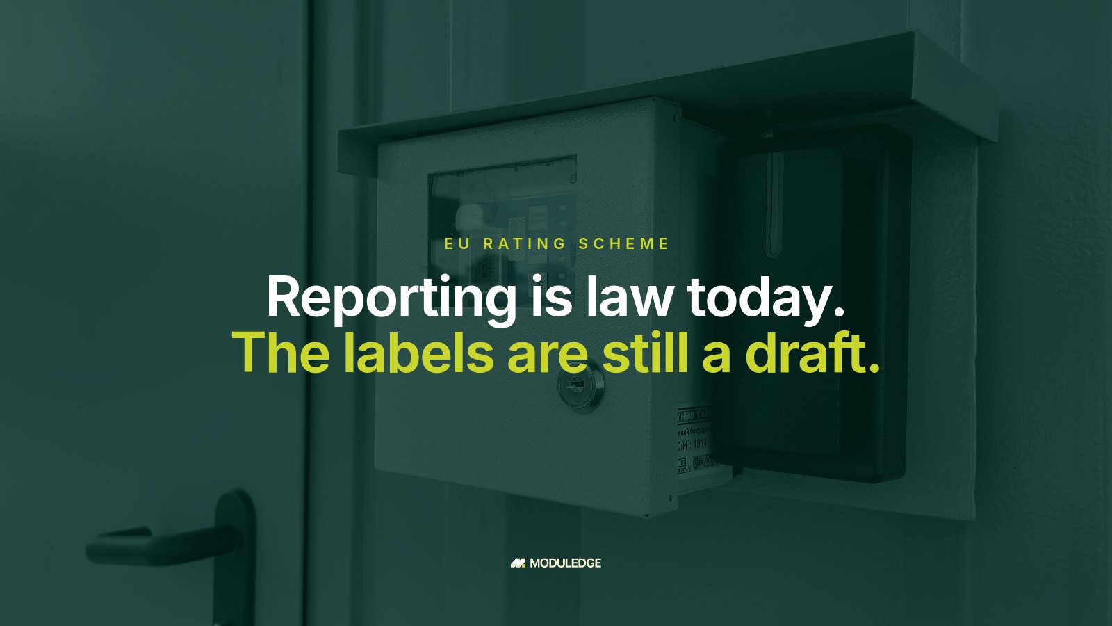 Wall-mounted control and monitoring panel inside a modular data center, with the headline "Reporting is law today. The labels are still a draft."