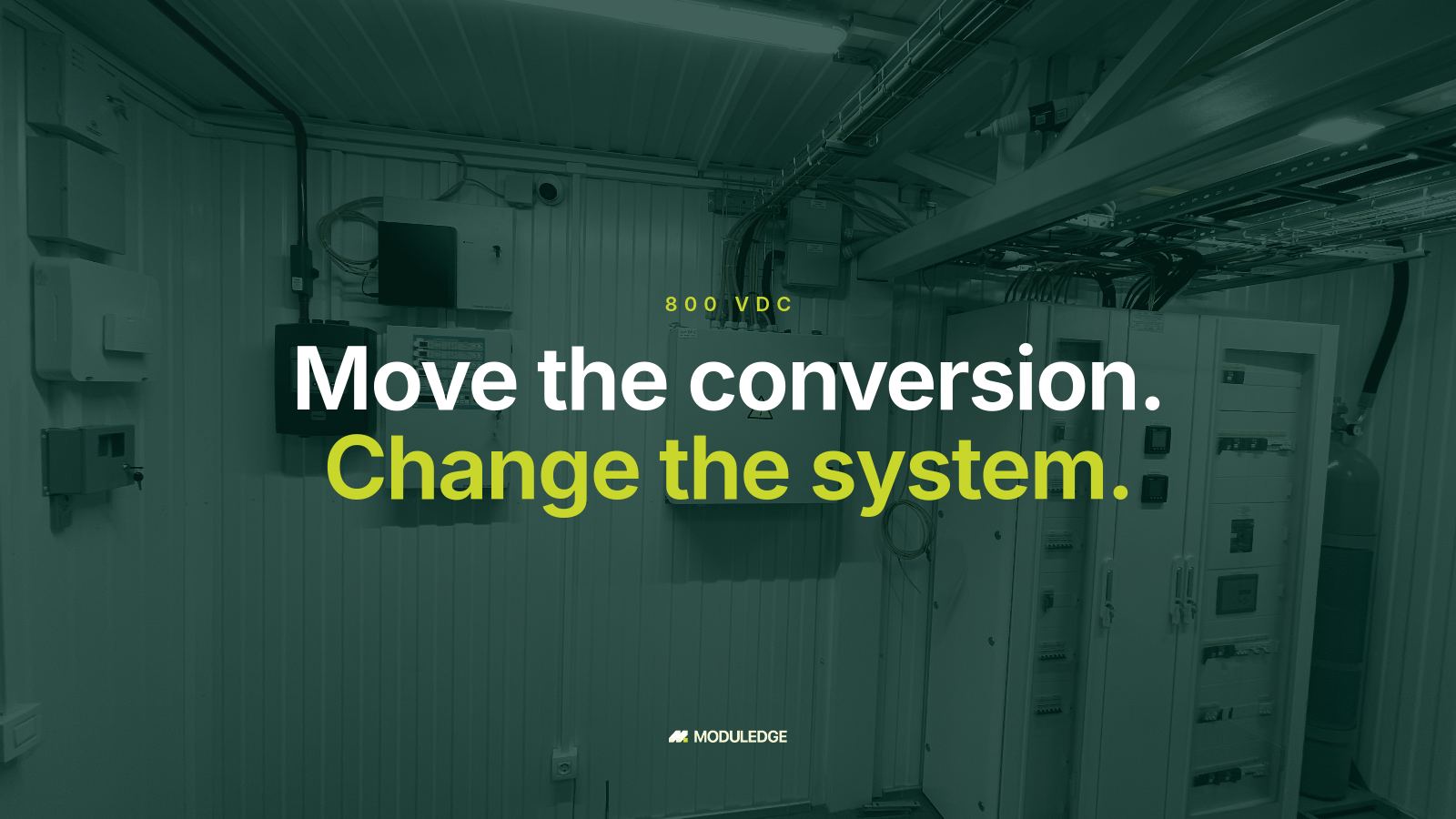 Power cabinets and cable trays inside a modular data-center room, with the headline "Move the conversion. Change the system."