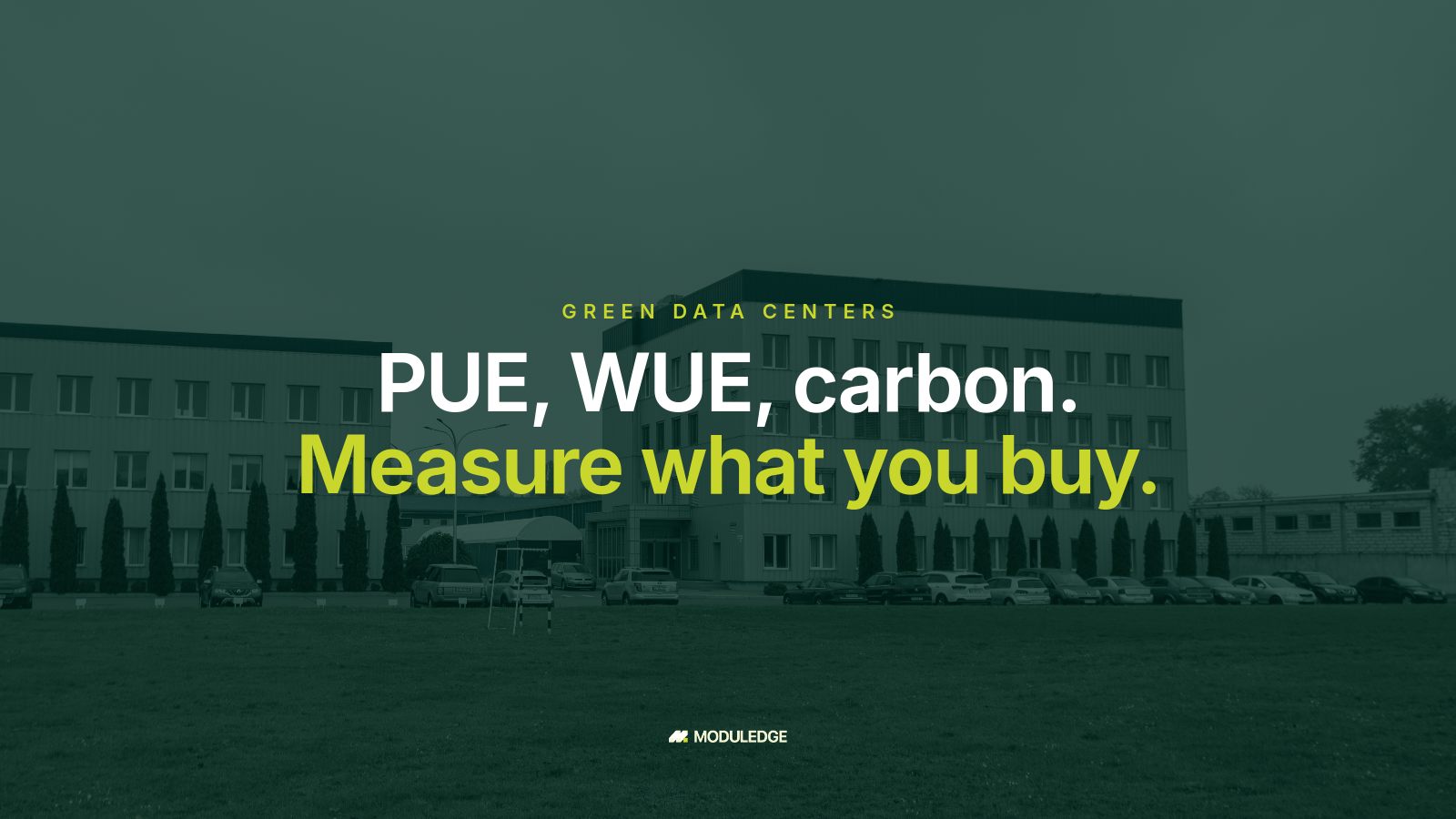 Office and industrial buildings across a green lawn, with the headline "PUE, WUE, carbon. Measure what you buy."