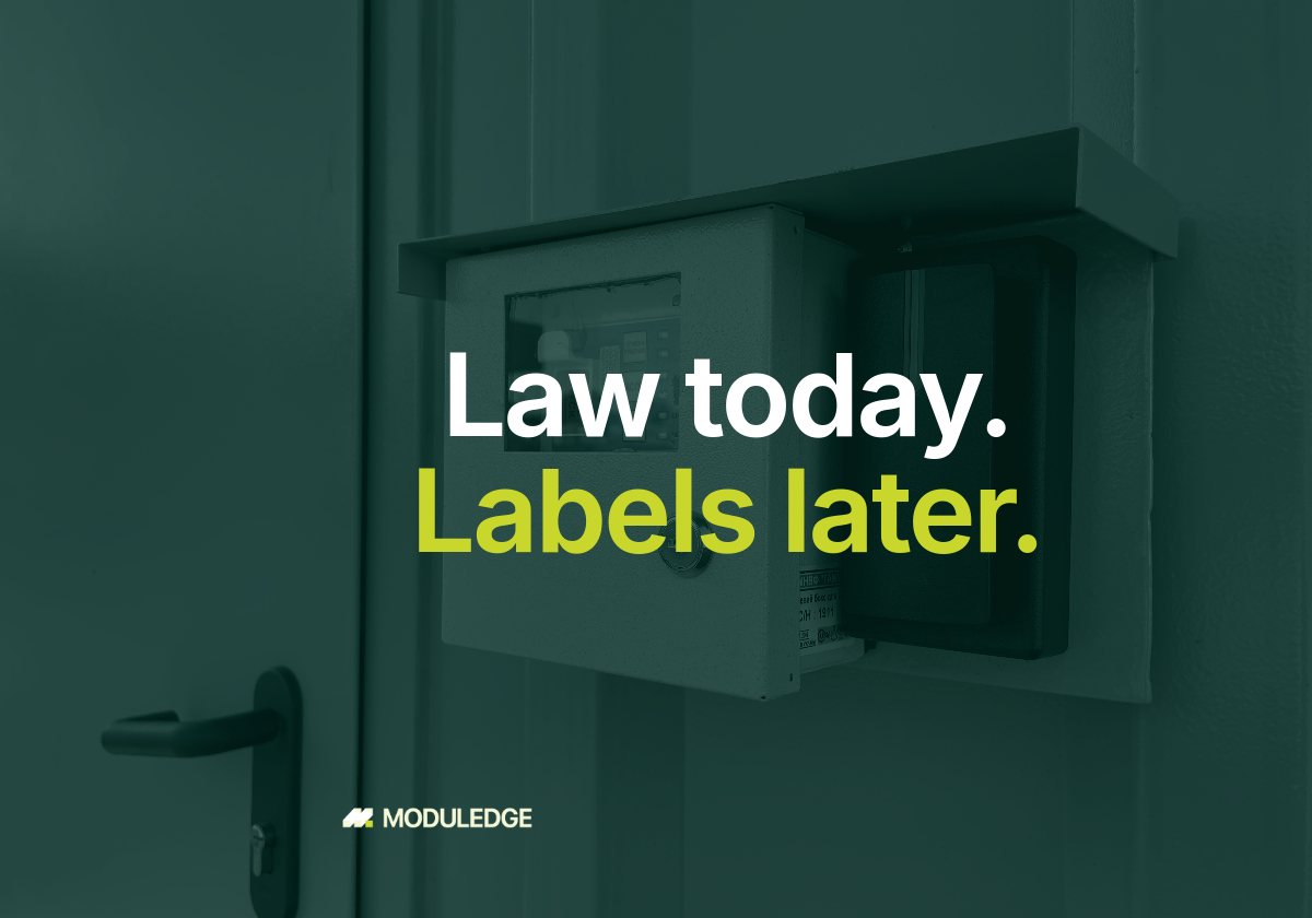 Wall-mounted control and monitoring panel inside a modular data center, with the headline "Law today. Labels later."