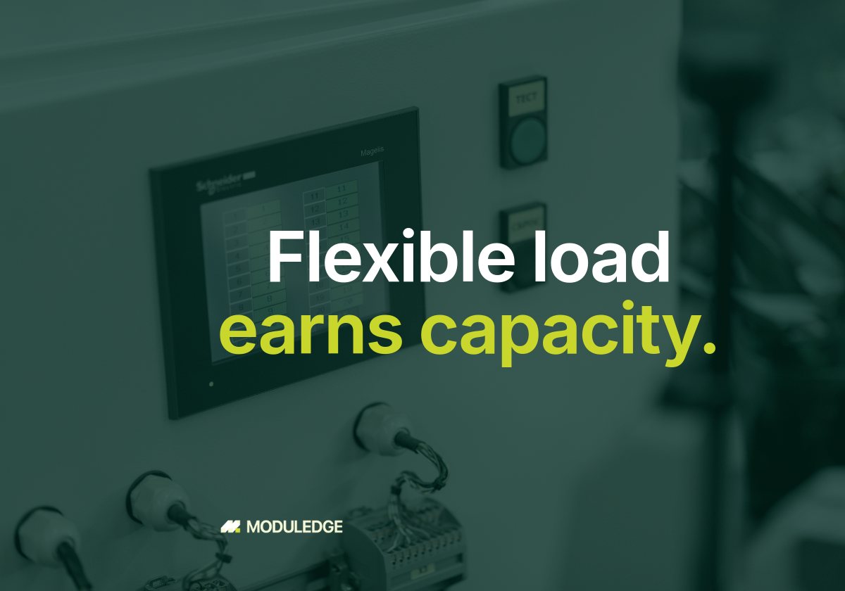 Gloved hand operating a touchscreen on an electrical control panel, with the headline "Flexible load earns capacity."