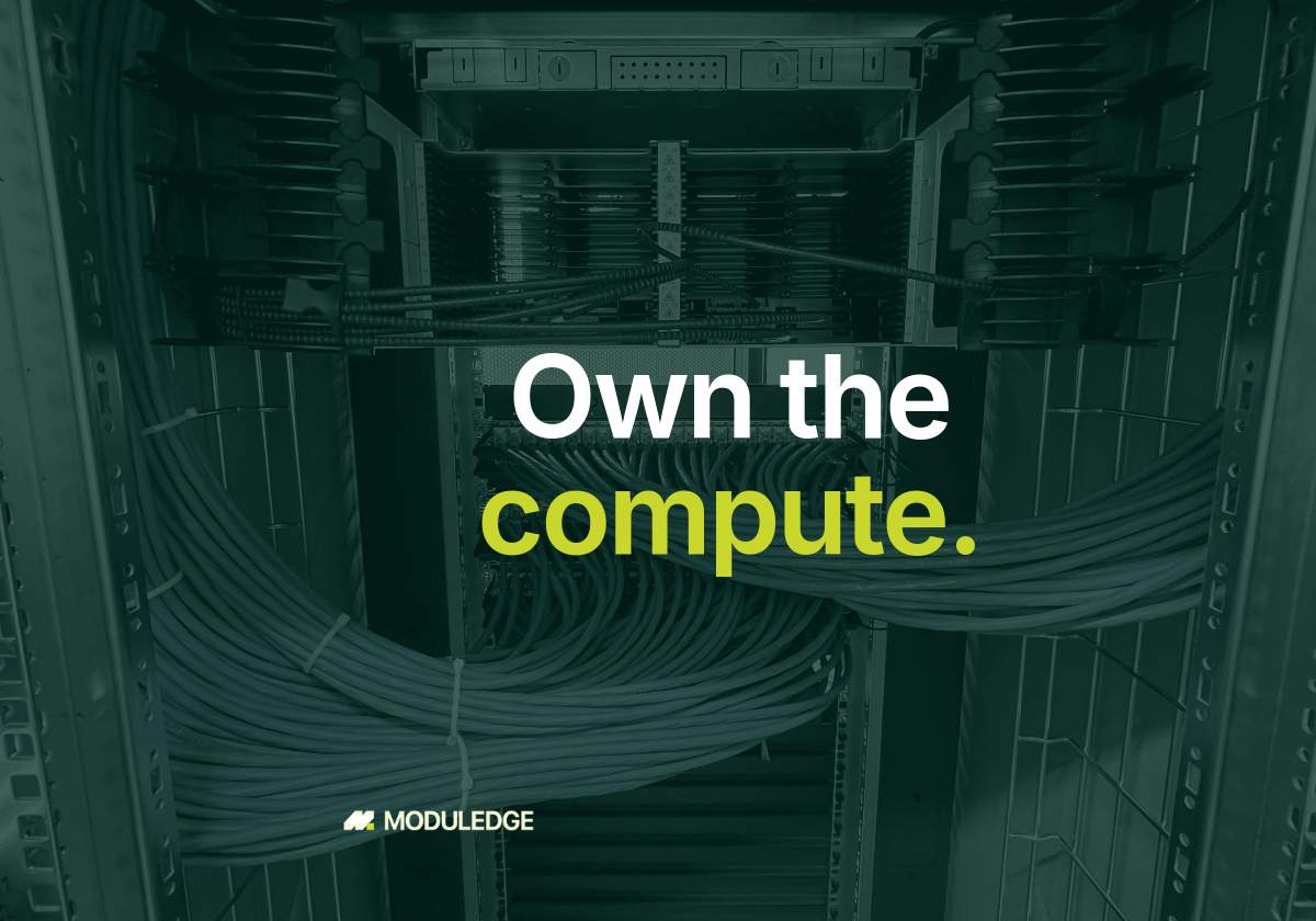 Blue fiber and network cabling routed through an open server rack, with the headline "Own the compute."