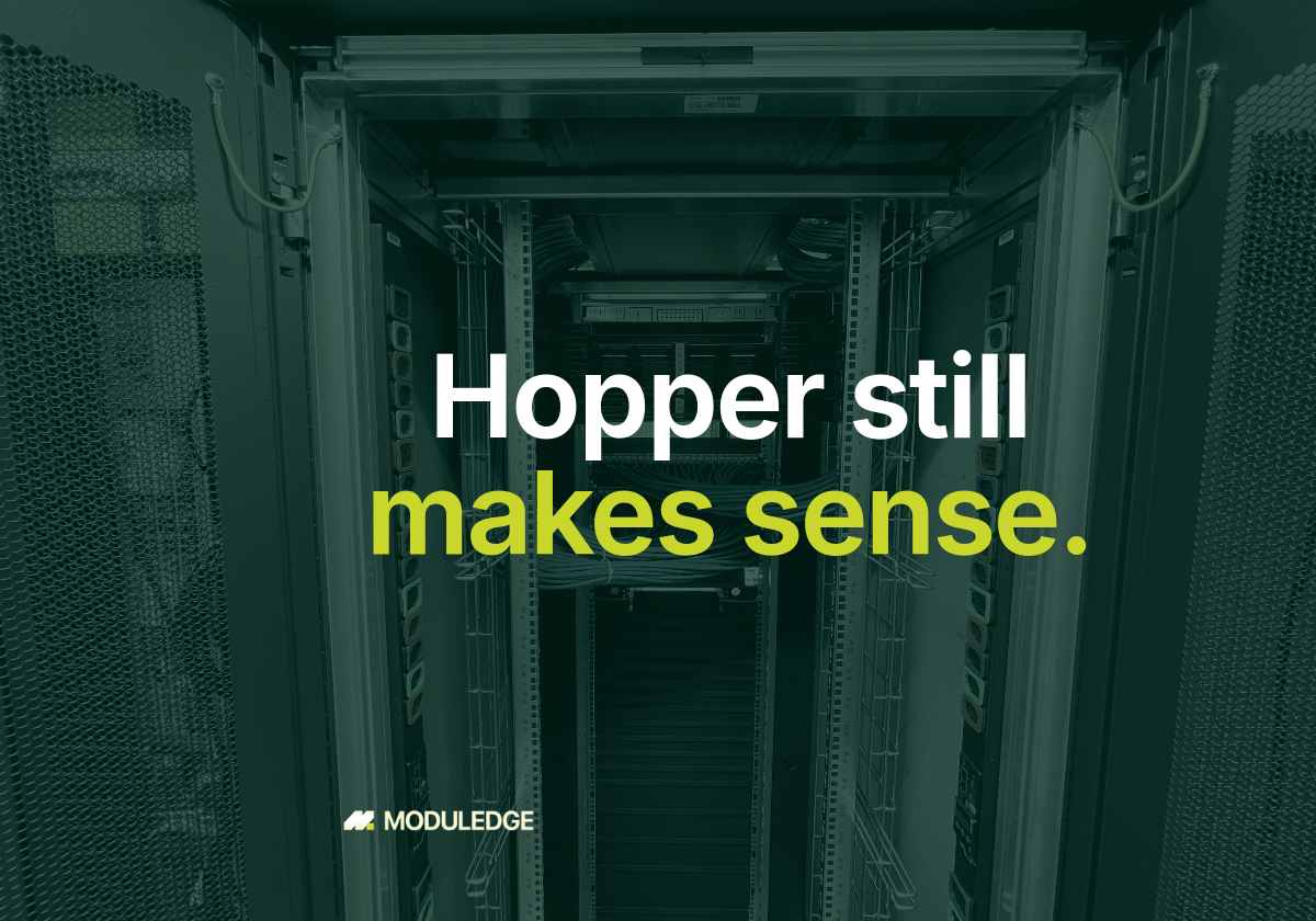 Bundled blue network cables inside a server rack, with the headline "Hopper still makes sense."
