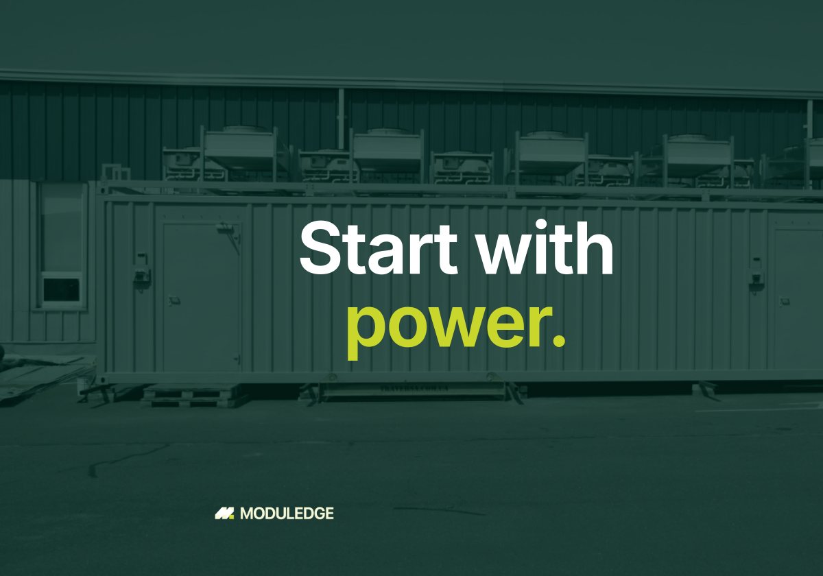 Long side of a white modular data-center container beside an industrial building, with the headline "Start with power."