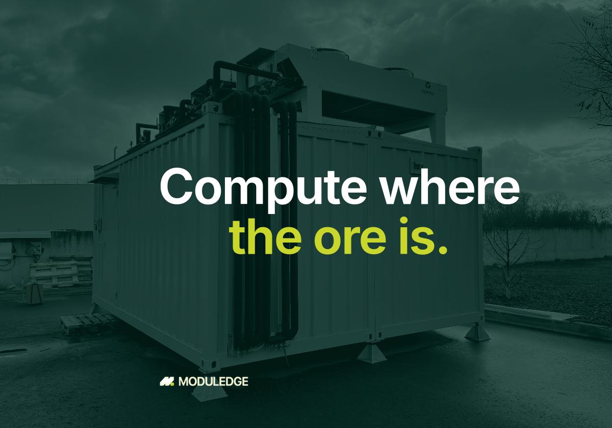 Modular data-center enclosure outdoors on an overcast day, with the headline "Compute where the ore is."