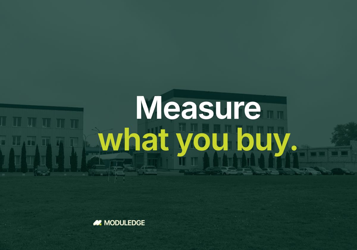 Office and industrial buildings across a green lawn, with the headline "Measure what you buy."