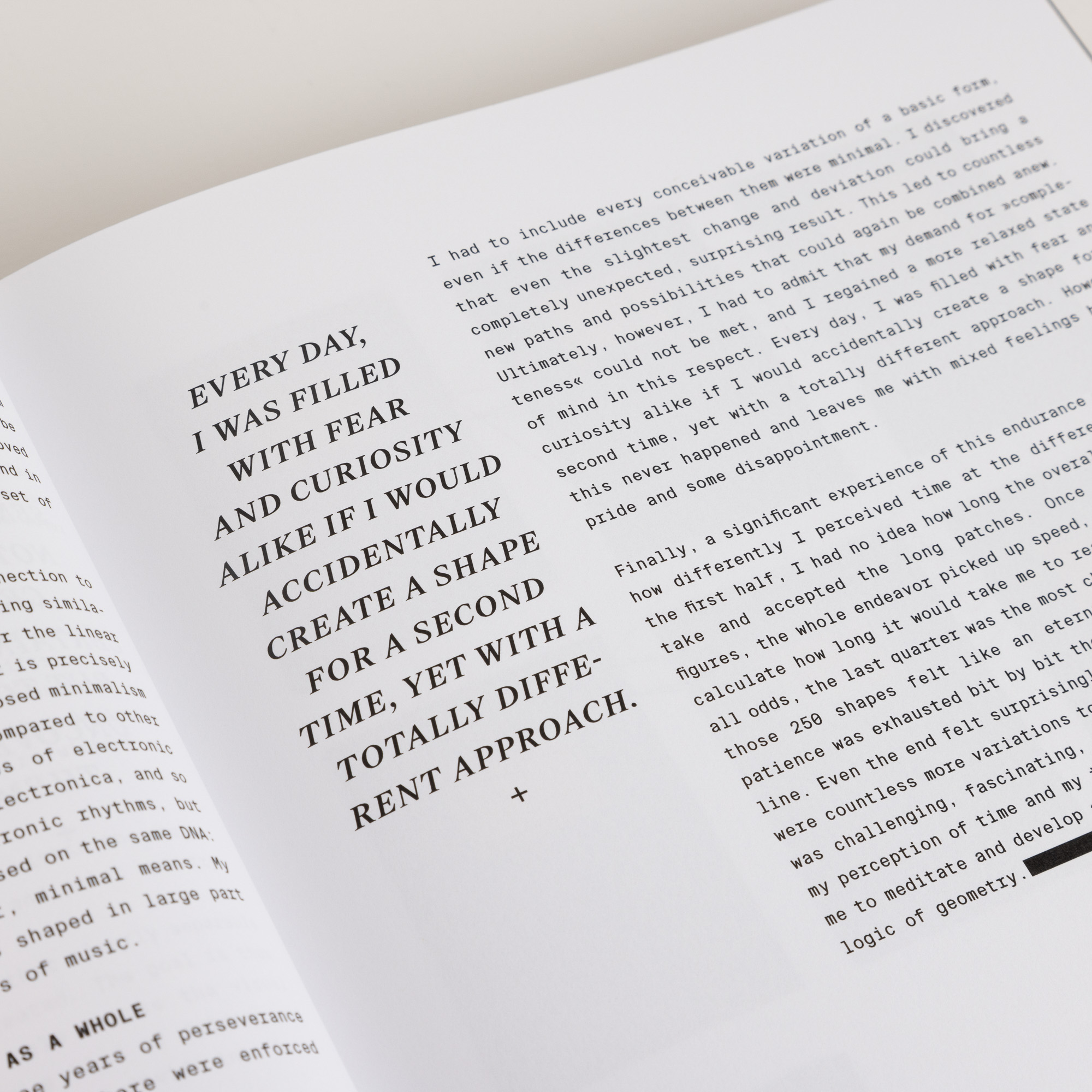 Open book showing a page with a bold text quote about fear and curiosity beside a column of typed text.