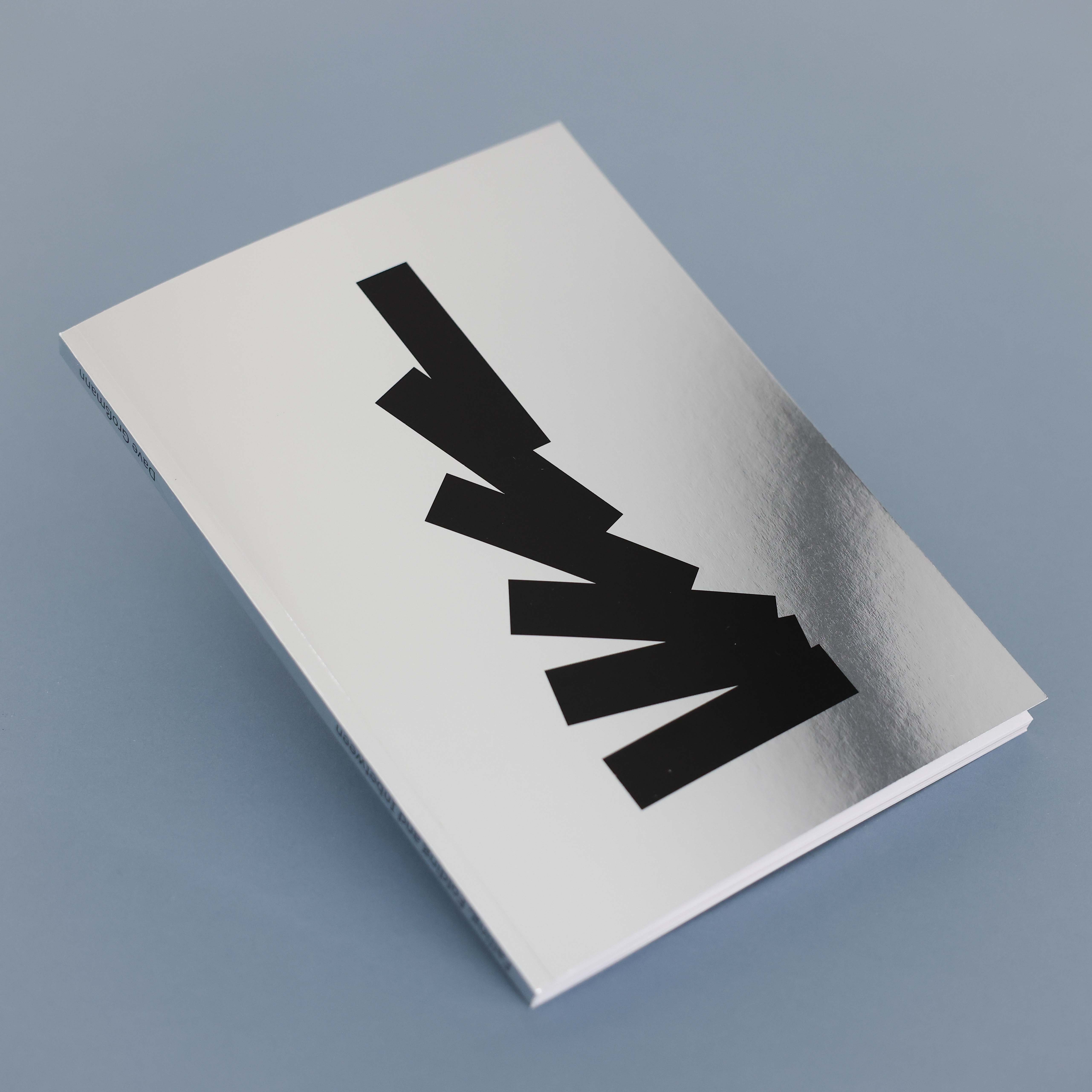 Black hardback book titled 'IN SHAPE' by Dave Grossmann featuring nine gold geometric shapes on the cover.