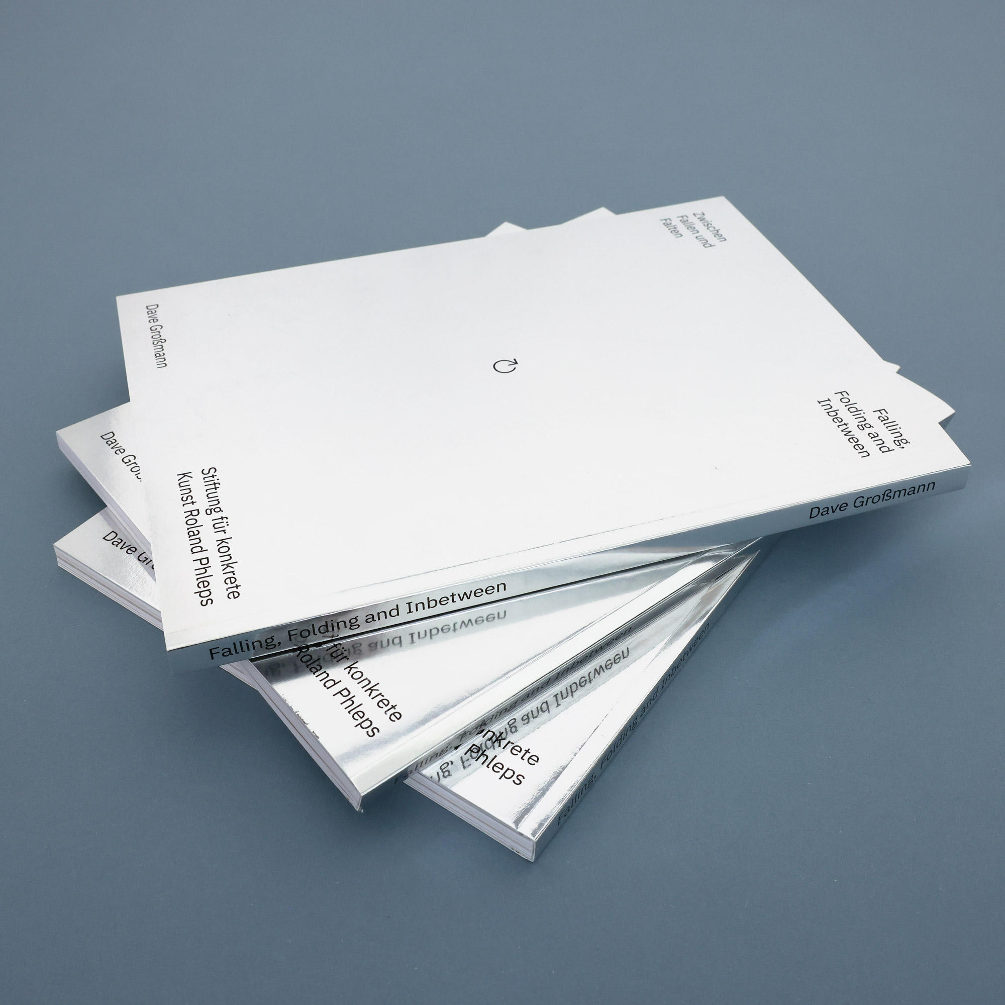 Two identical black books standing upright, titled 'IN SHAPE' by Dave Grossmann with a white geometric logo.