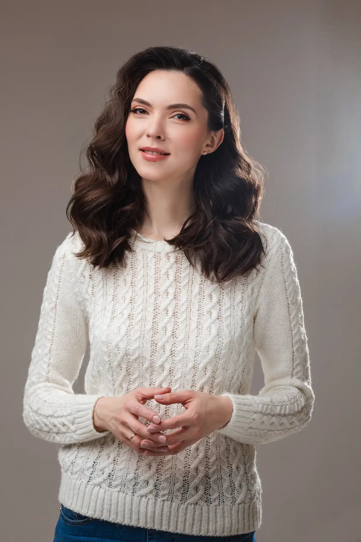 Portrait of woman wearing beige sweater