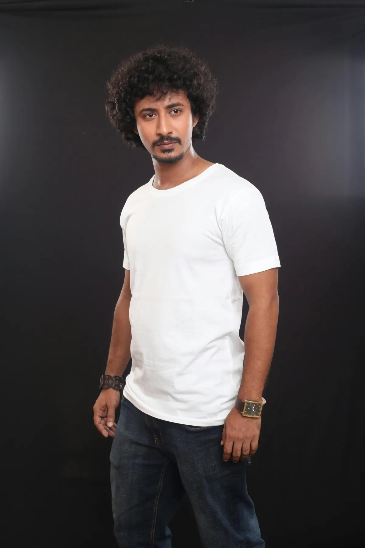 Portrait of man wearing white t-shirt standing