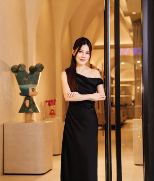 Dr Michelle Ng at the entrance of ARTÉ by Dr. M