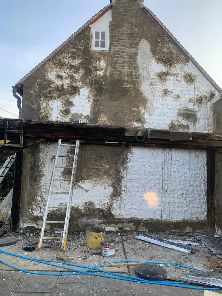Exterior repair and painting project at a residential property overseen by LD Sussex Decoration