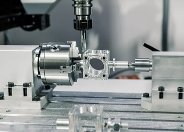 CNC milling machine performing high-precision machining on a metal part.