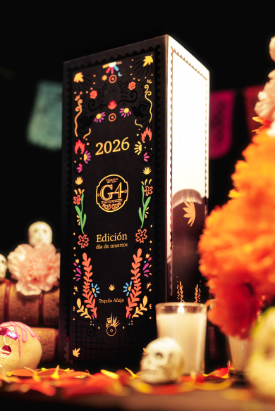 G4 Día de Muertos bottle and box on an ofrenda