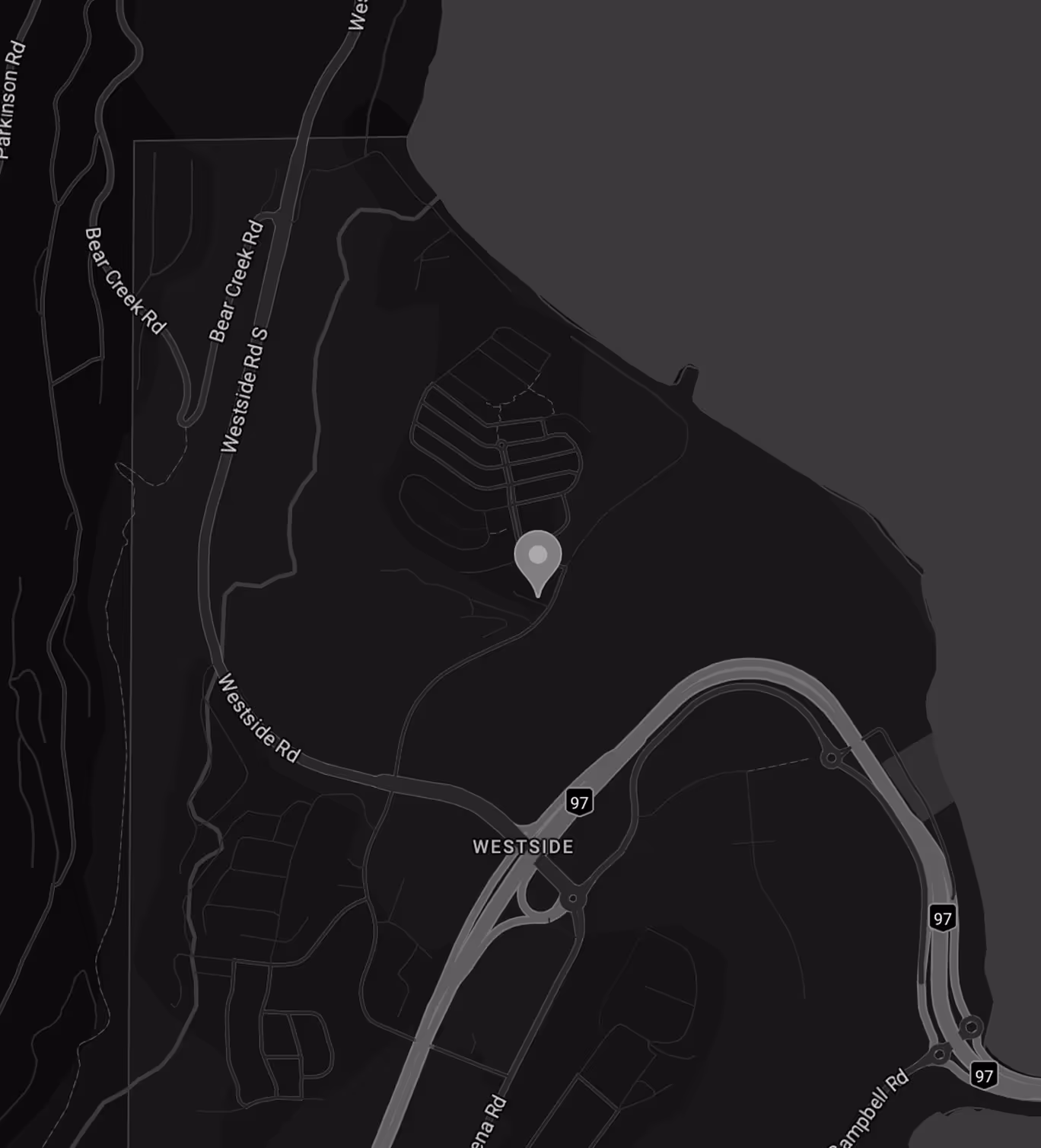 Map showing a location marked with a pin near Westside Road and Highway 97 in a dark theme, with nearby roads including Bear Creek Road and Campbell Road.