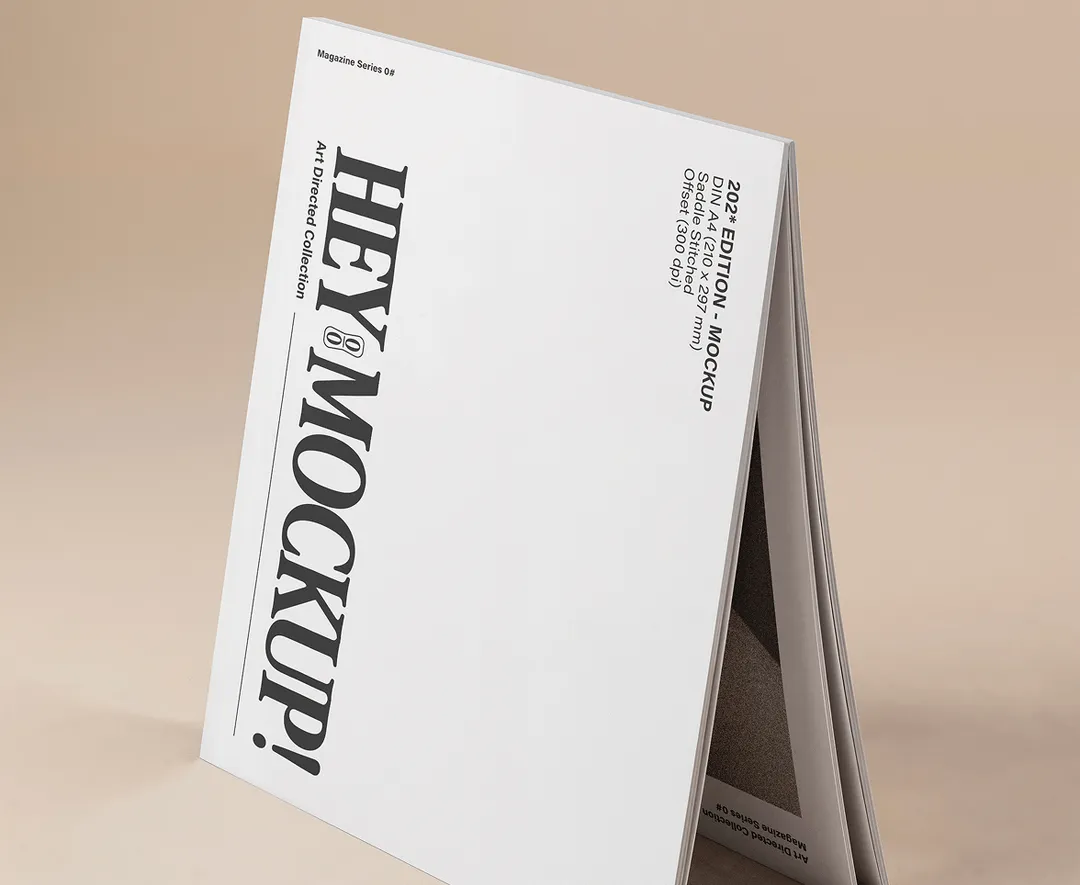 Standing book mockup with text "HEY MOCKUP!" on cover.