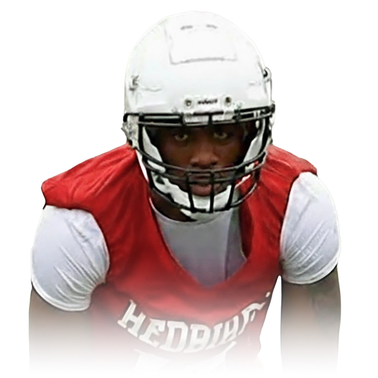 American football player wearing a white helmet and red practice jersey with the word 'HEDBRAY' visible.