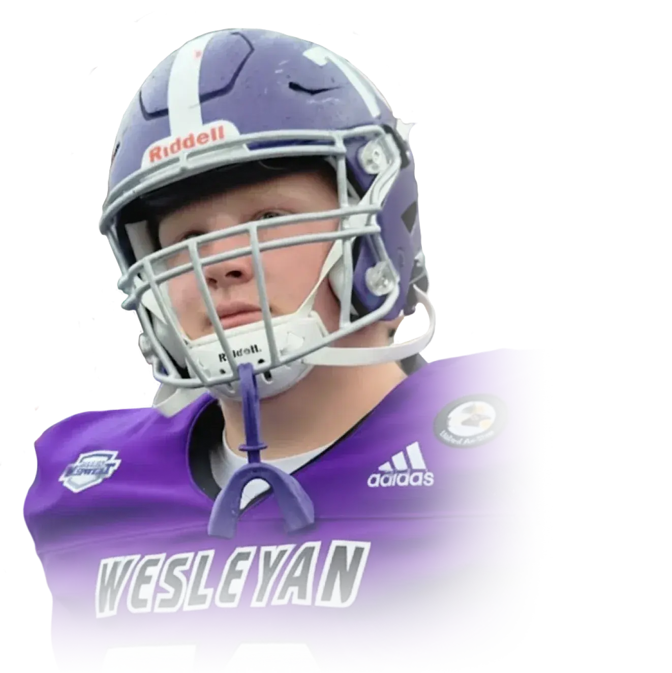 American football player in purple Wesleyan jersey and helmet looking slightly to the side.