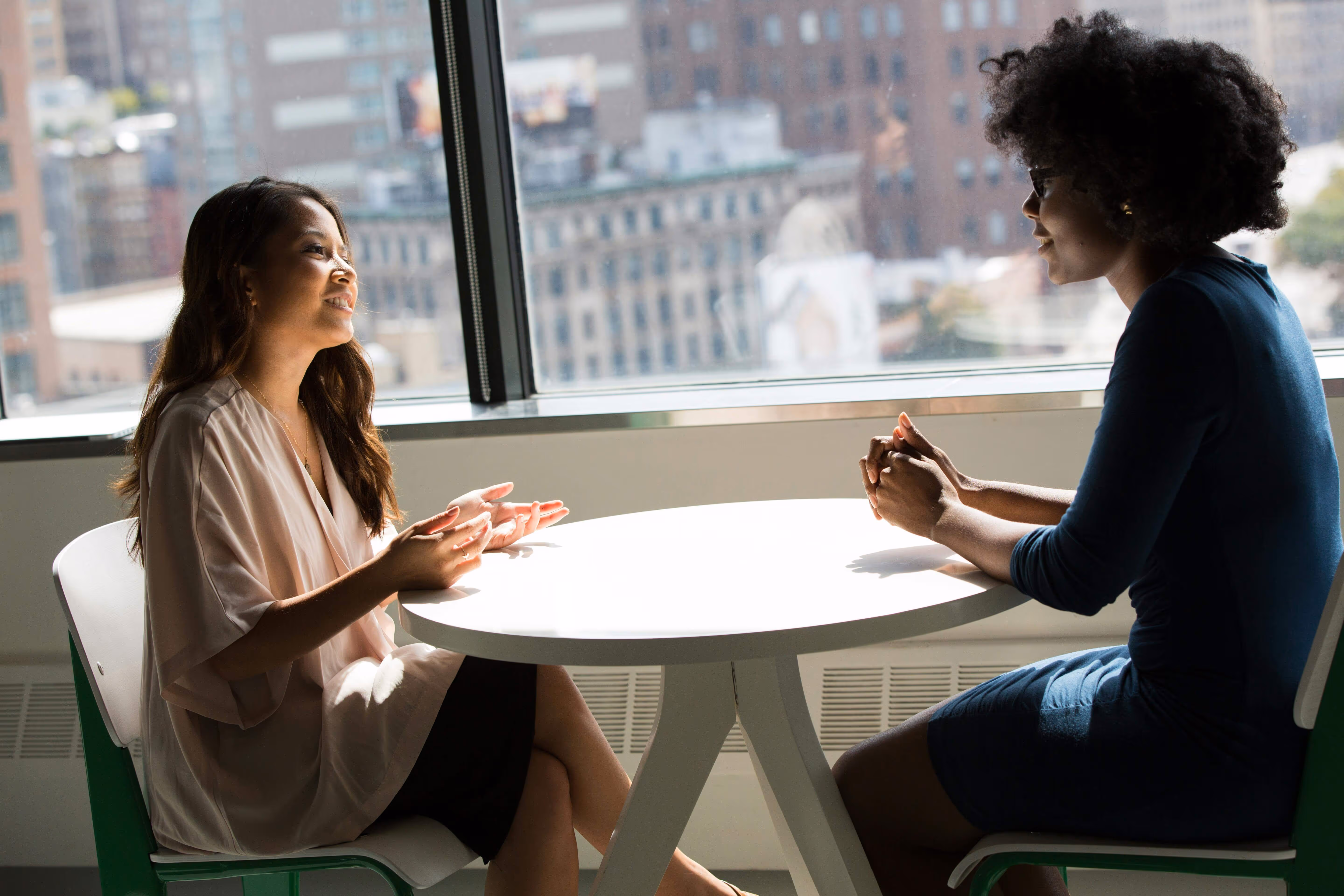 Two women having a travel safety consultation.