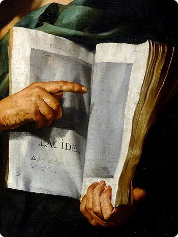 Close-up of two hands holding and pointing at an open old book with worn pages and partially visible text.