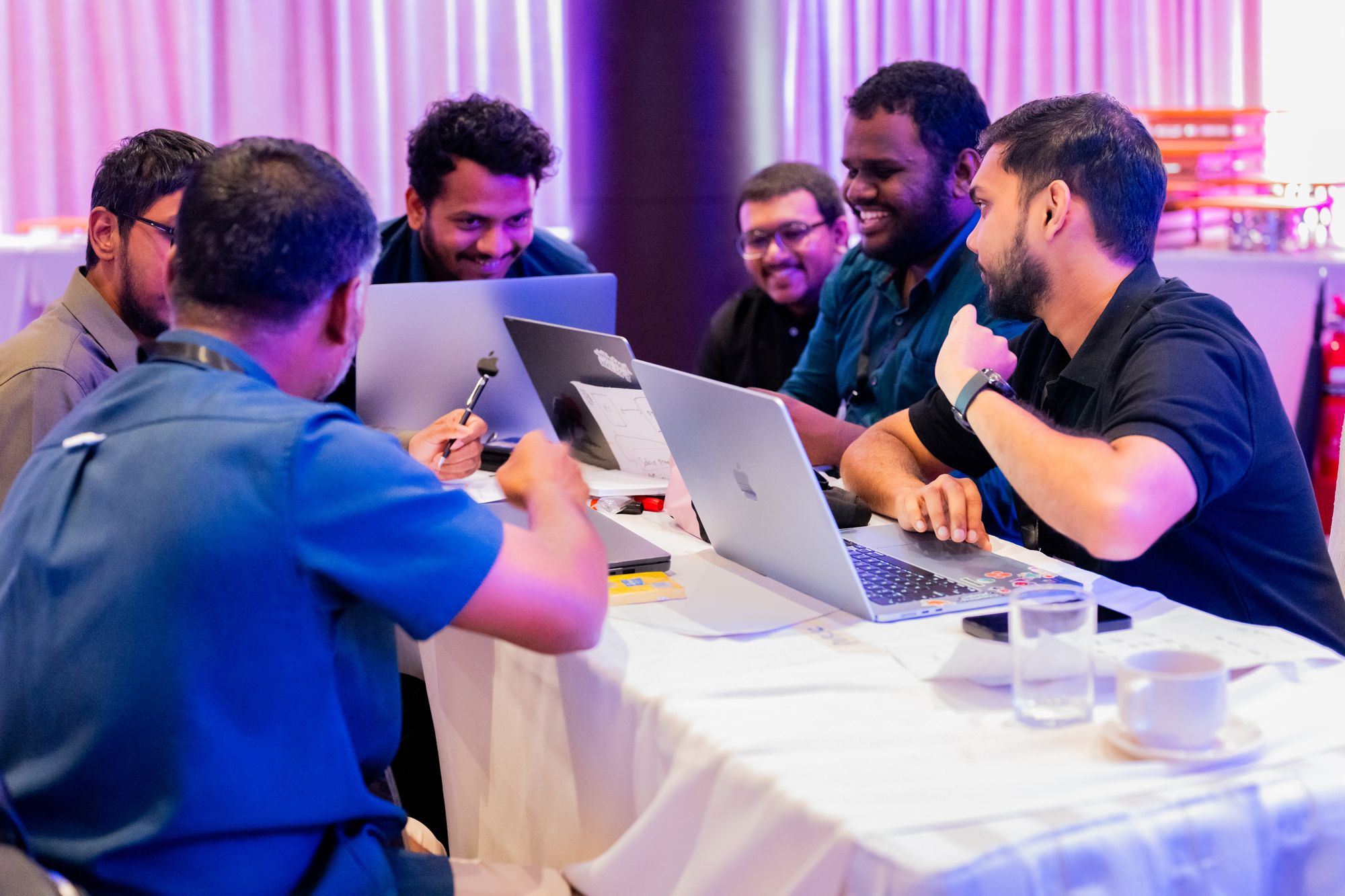 Participants working together on laptops during a Future Institute session