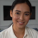 Female influencer recording video tutorial how put medical face masks from home