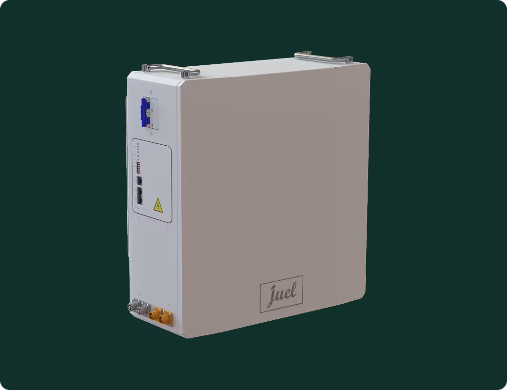 Rectangular white electronic device with ports and the brand name 'juel' on the front.