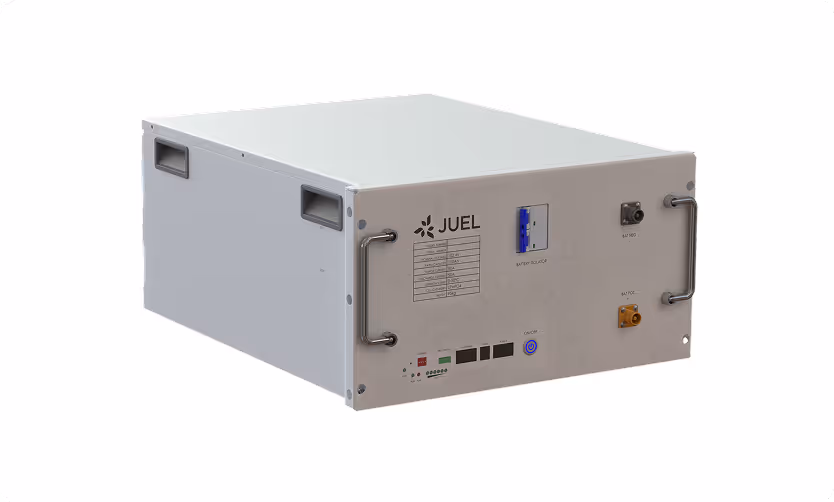 Rectangular electrical device with handles on front and sides, labeled JUEL, featuring switches, ports, and status indicators on the front panel.