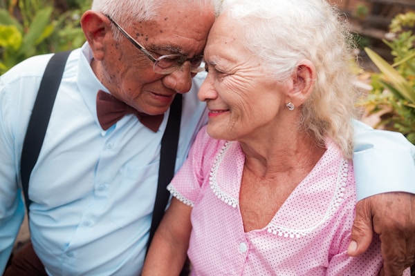 A man and a woman standing next to each other