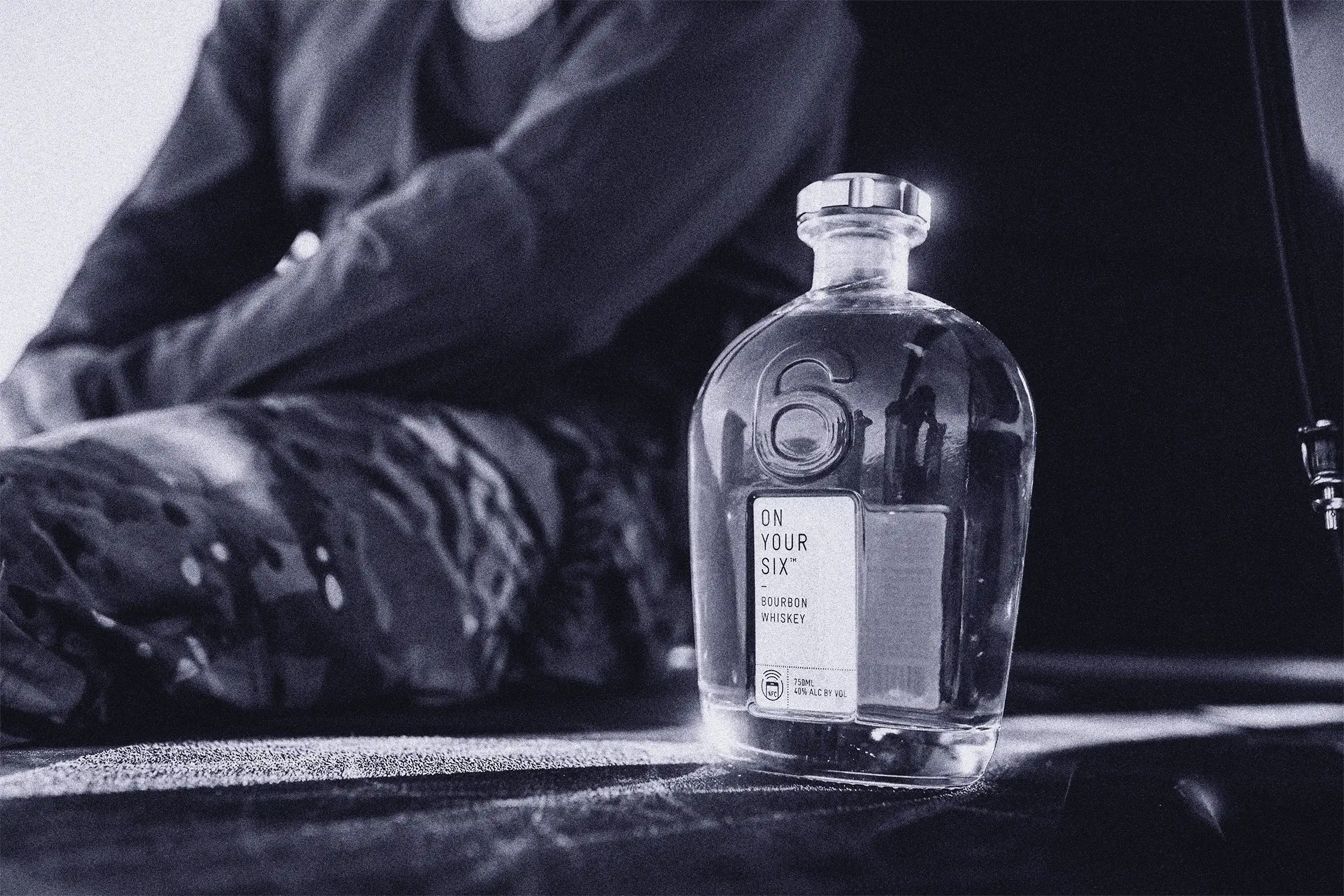 A bottle of alcohol with the number 6 on it.