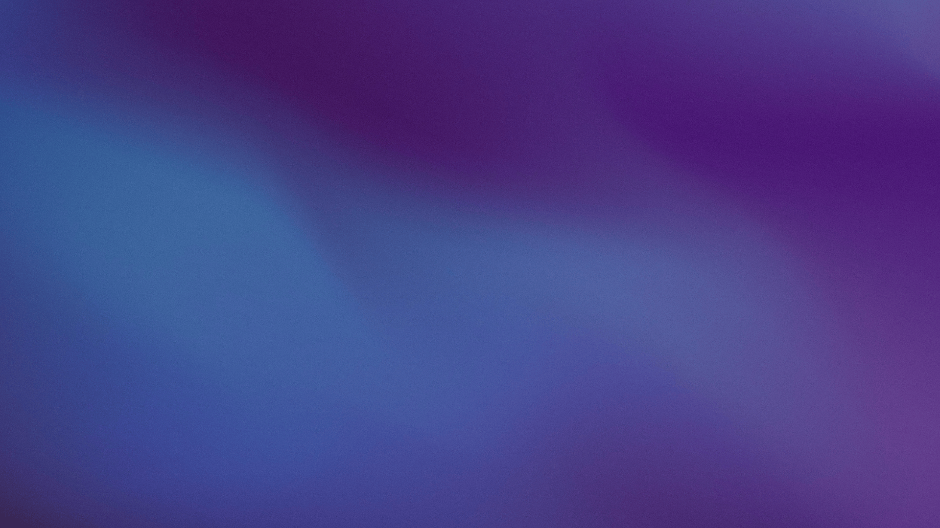 Blurred gradient background blending shades of blue and purple.