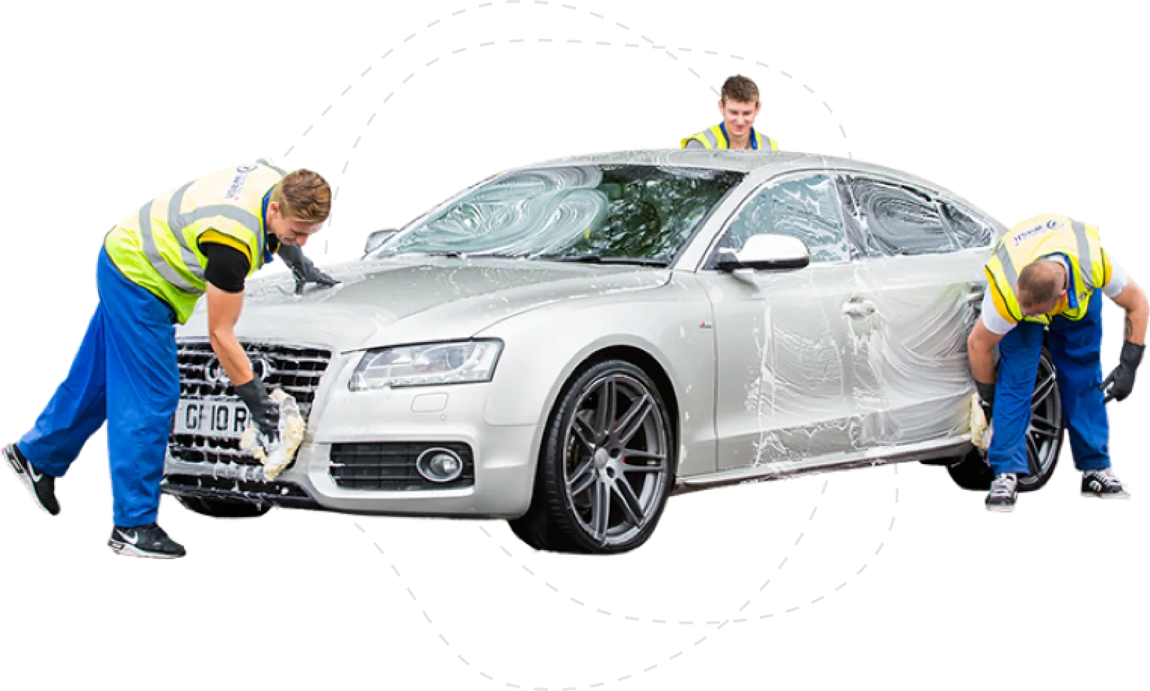 Three workers in yellow safety vests and blue pants washing a white car with soap and sponges.
