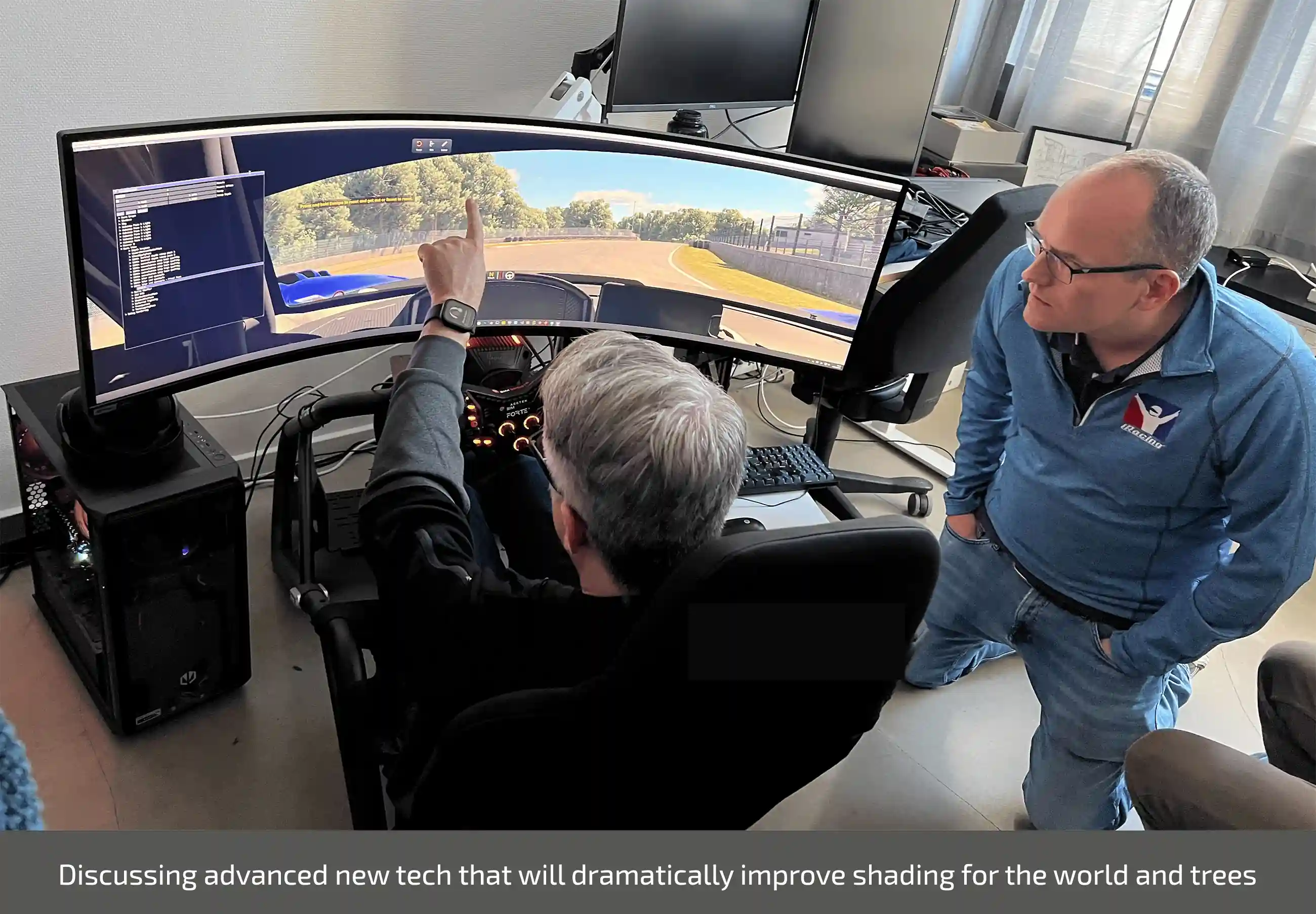 iRacing's developers testing an early version of their new rendering engine in a small racing simulator in Copenhagen.