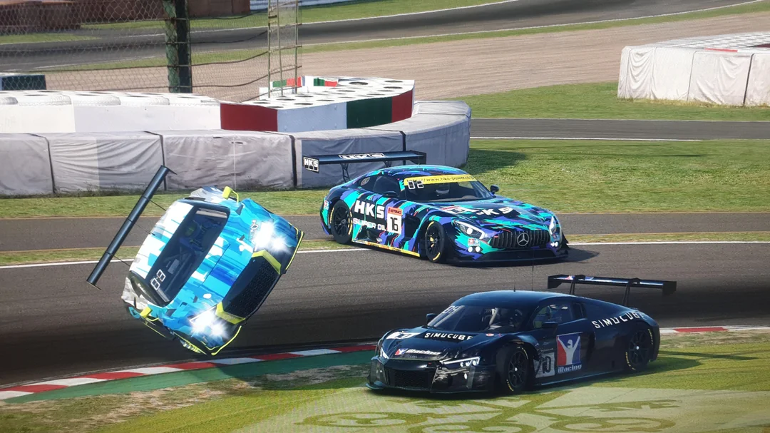 A crash between 3 GT3 cars at a corner in iRacing.