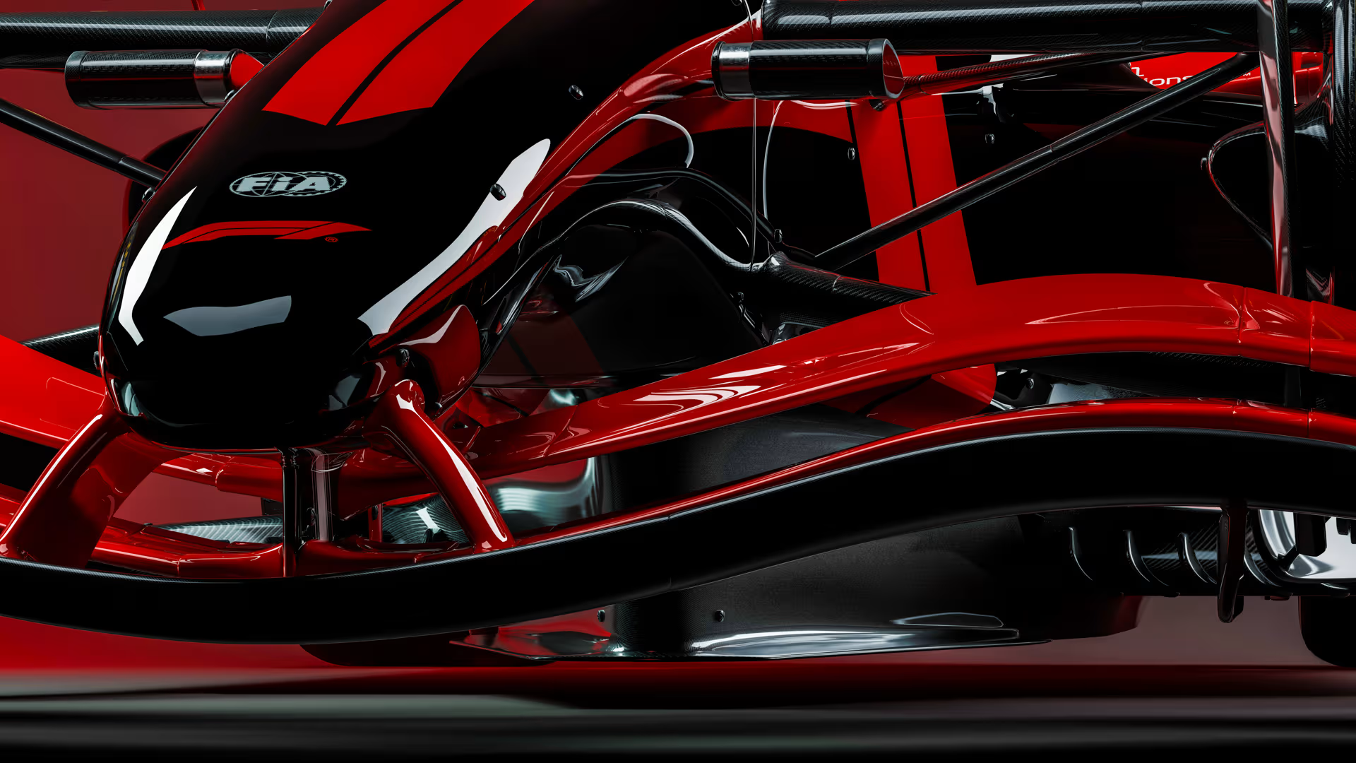 A new 2026 F1 car in a red and black livery shown as a close up on the front wing.