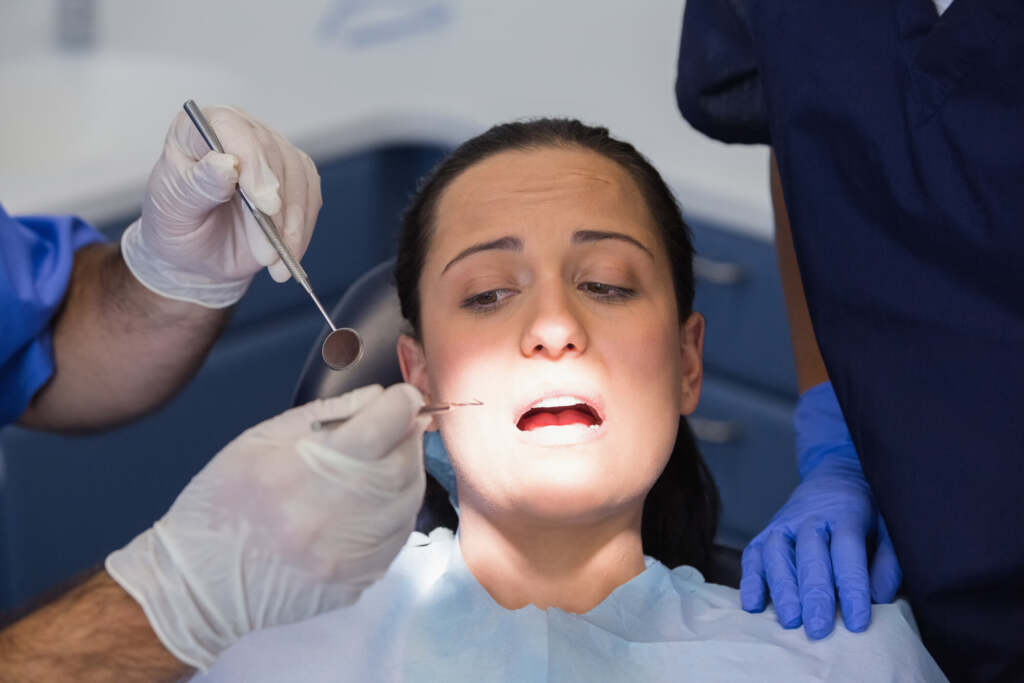 woman at the Dentist in 10458