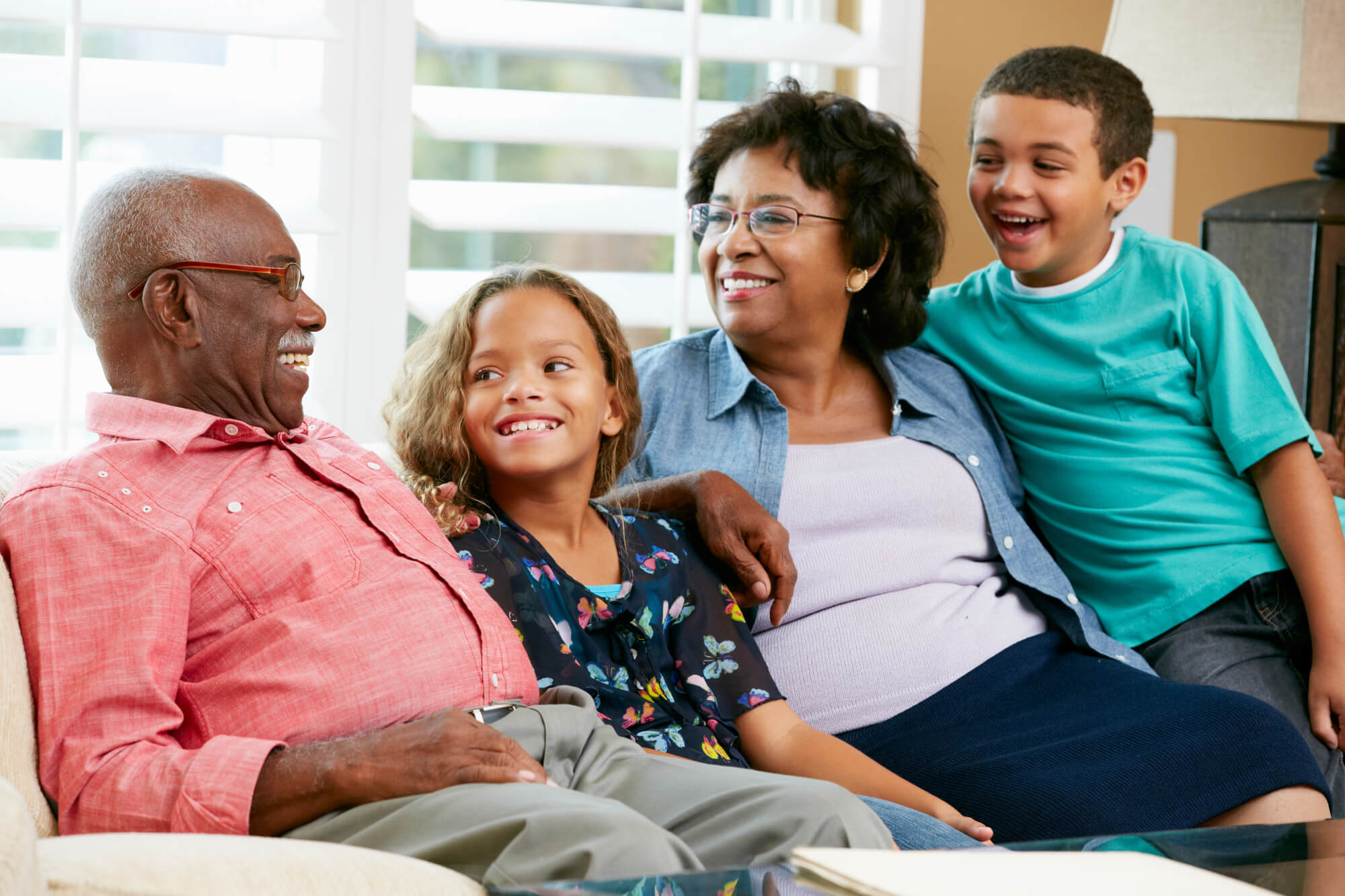 grandparents smiling using dentures in Dyckman