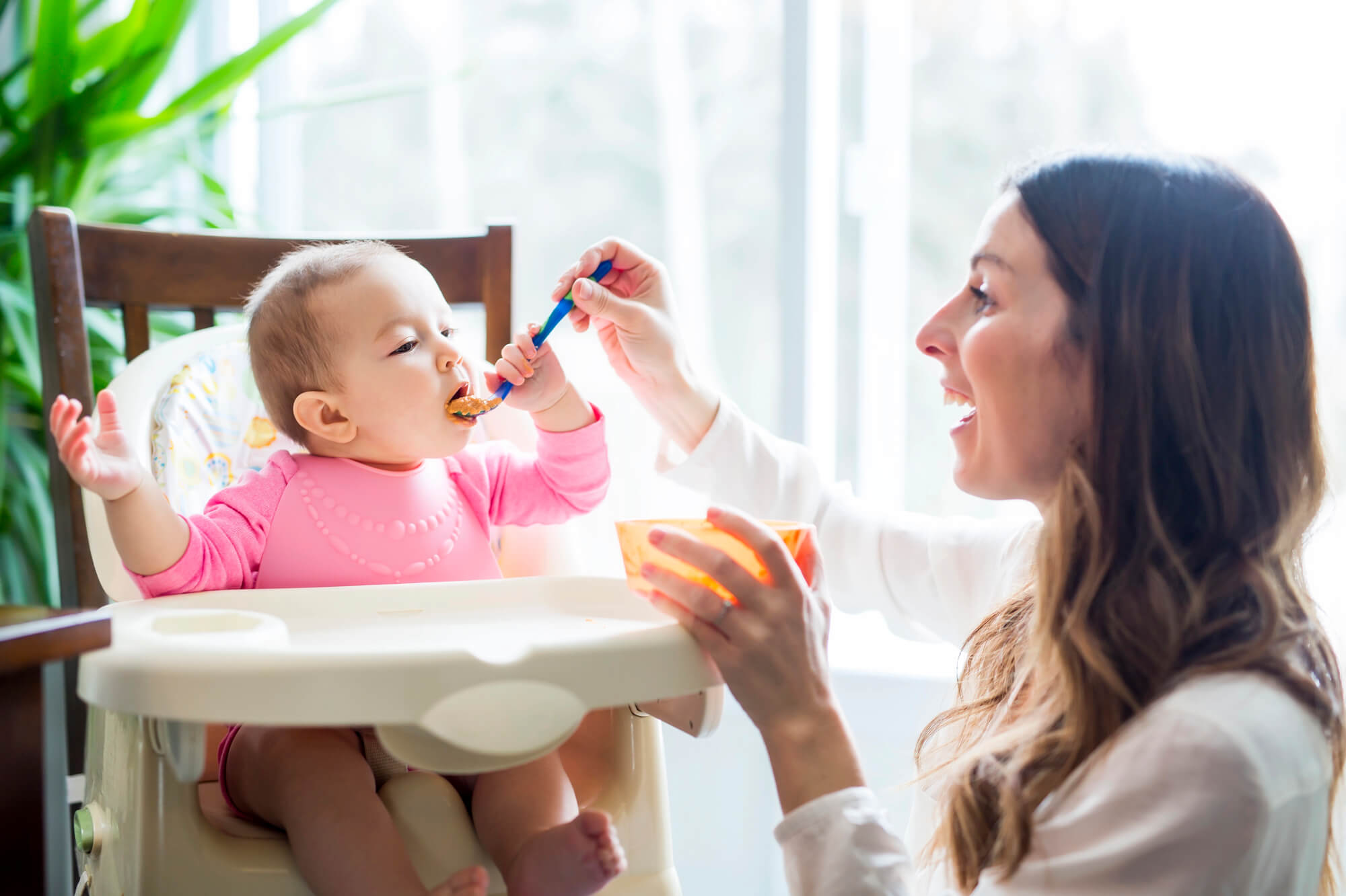 ny pediatric dentistry mom feeding baby with soft food