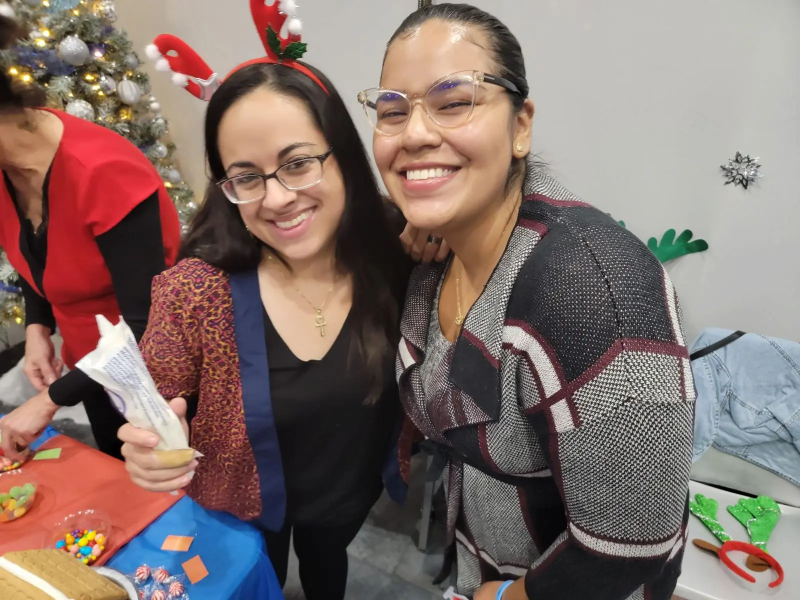 a couple of women standing next to each other