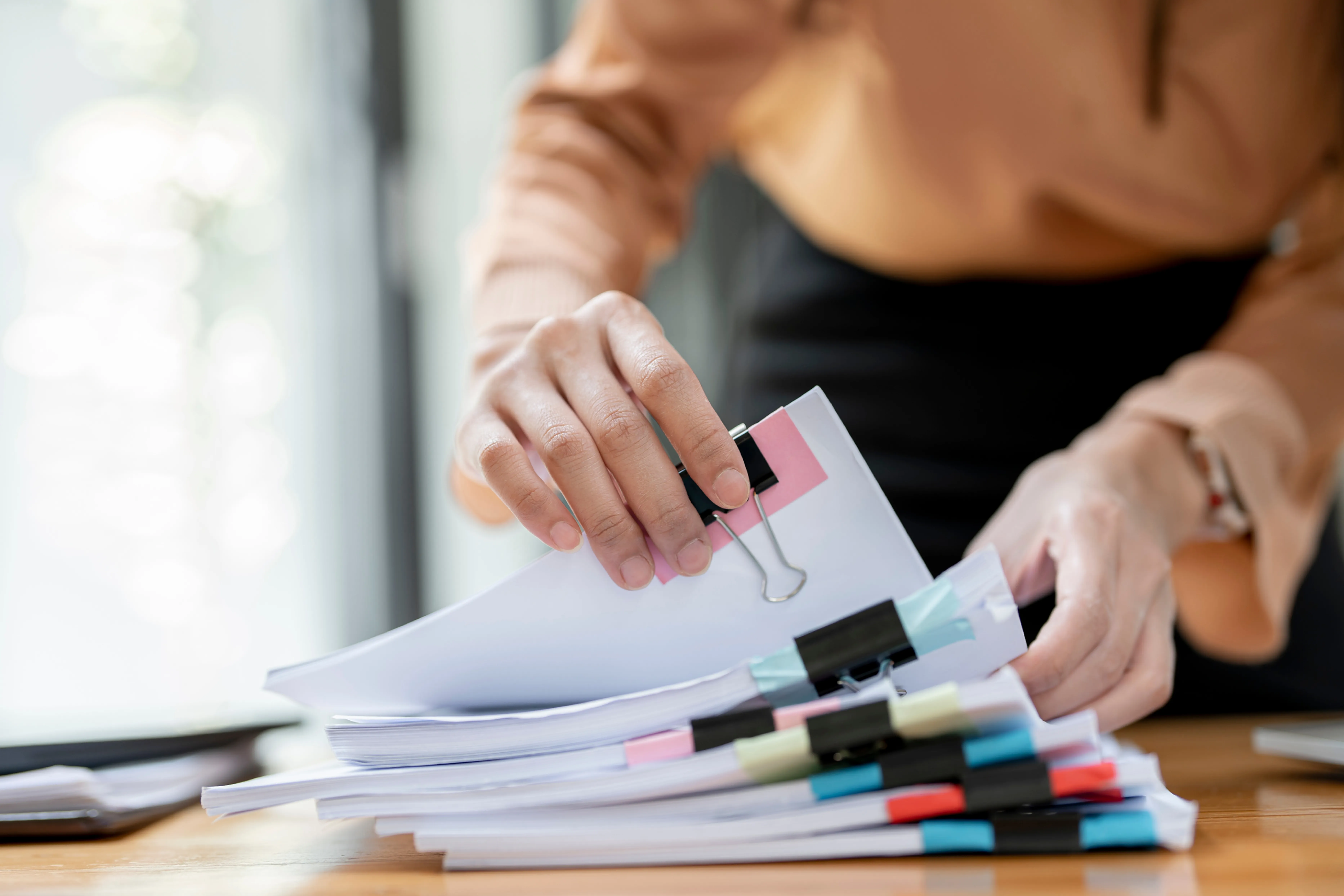 Person is going through documents