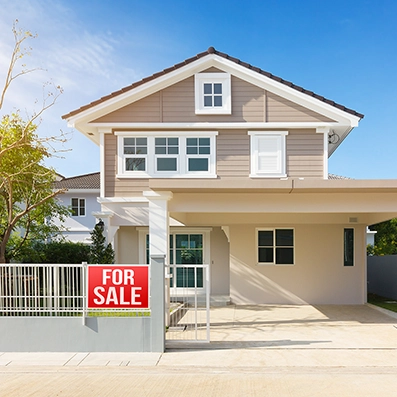 Front view of a home listed for sale, representing Peak Pro Home Services’ $299 pre-sale home assessment for sellers preparing their property for market.
